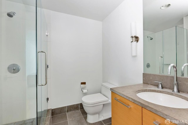 301 Mission St Unit 8E, San Francisco, CA 94105 - full bathroom with vanity, a shower stall, toilet, and tile patterned floors