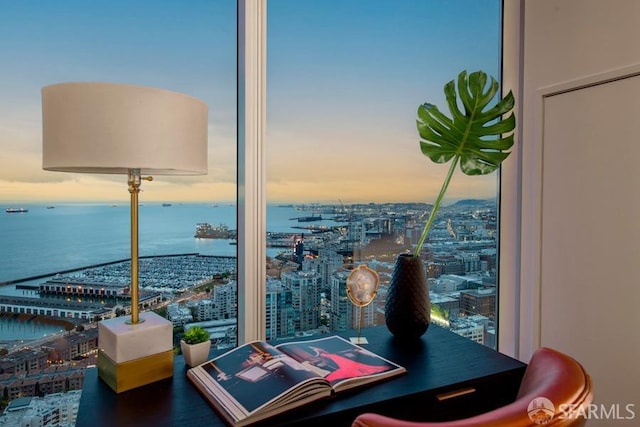 balcony at dusk with a water view