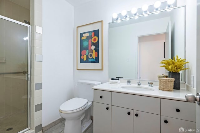 bathroom featuring vanity, toilet, tile patterned floors, and an enclosed shower