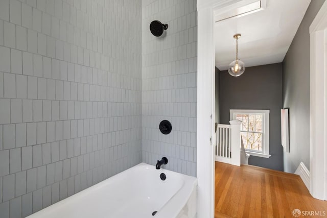 bathroom featuring bathing tub / shower combination