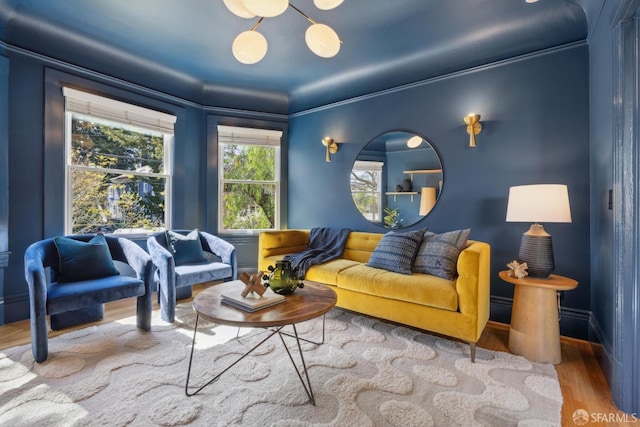 living area featuring wood finished floors and baseboard heating