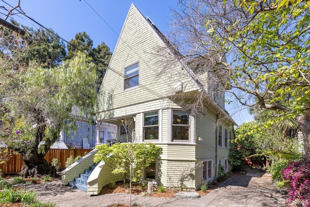 exterior space with stairway and fence