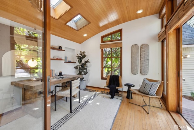 home office with baseboards, lofted ceiling with skylight, recessed lighting, wooden ceiling, and wood-type flooring