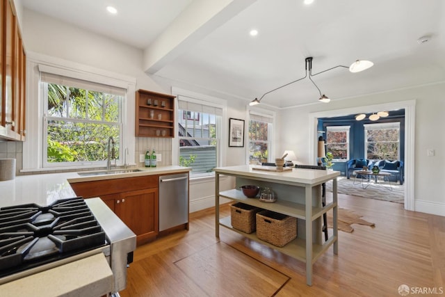 kitchen with open shelves, a sink, stainless steel dishwasher, brown cabinetry, and light countertops