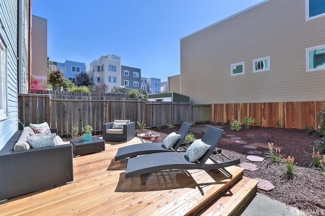 wooden terrace featuring an outdoor hangout area