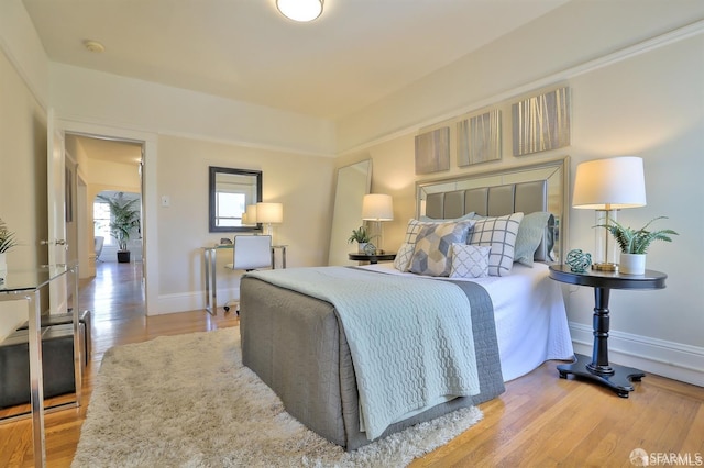 bedroom featuring light hardwood / wood-style flooring