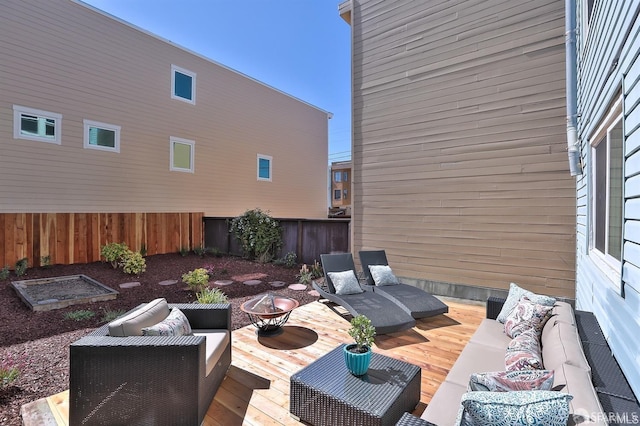 view of patio with outdoor lounge area and a wooden deck