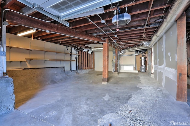 basement featuring gas water heater