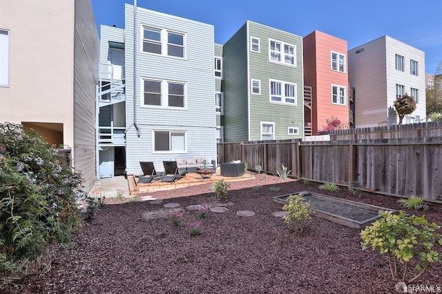 rear view of house with a patio area