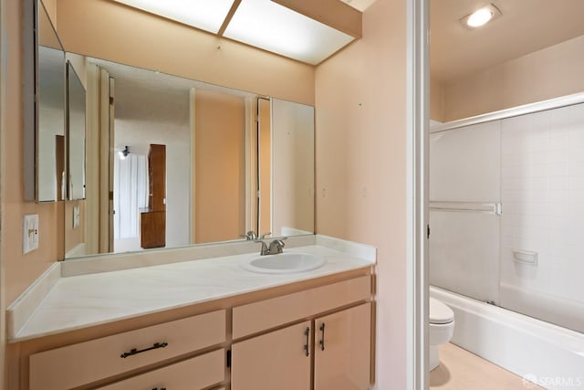 full bathroom with vanity, toilet, and shower / washtub combination