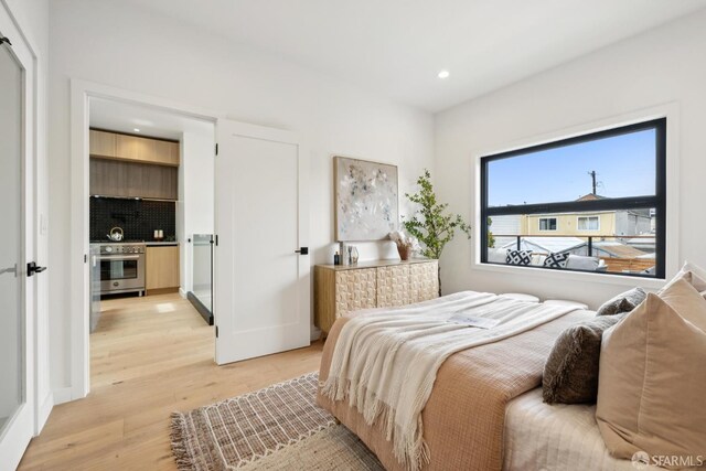 738 Athens St, San Francisco, CA 94112 - bedroom featuring light wood-style floors and recessed lighting