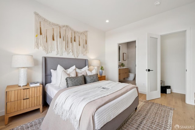738 Athens St, San Francisco, CA 94112 - bedroom featuring light wood-type flooring, recessed lighting, and ensuite bath