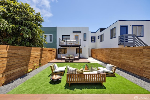 738 Athens St, San Francisco, CA 94112 - back of house with an outdoor living space, a balcony, a fenced backyard, and a patio