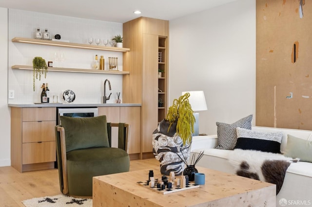 738 Athens St, San Francisco, CA 94112 - living room featuring wet bar, light wood-style flooring, and recessed lighting