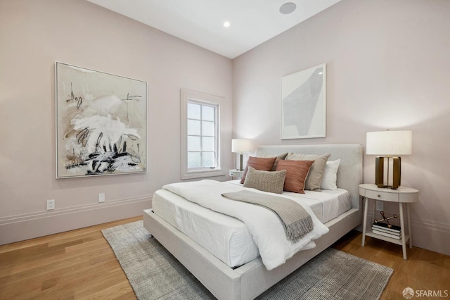 bedroom featuring hardwood / wood-style flooring