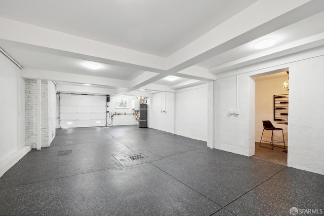 garage featuring water heater