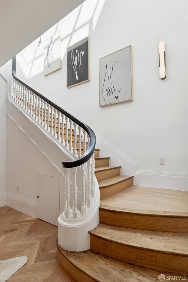 stairs with parquet floors