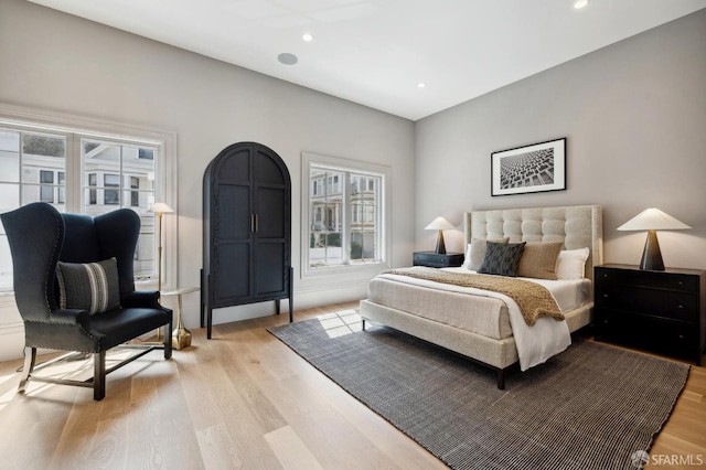 bedroom with light hardwood / wood-style floors