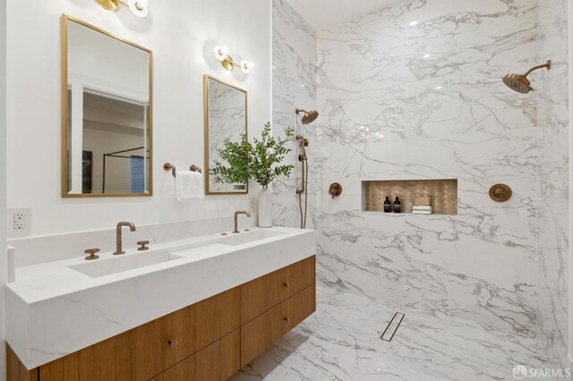 bathroom featuring vanity and a shower