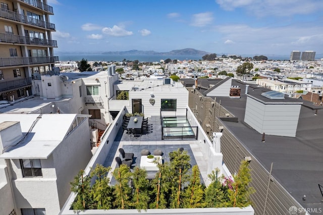 birds eye view of property featuring a mountain view