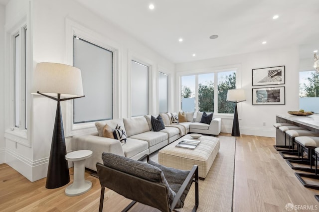 living room with light hardwood / wood-style floors