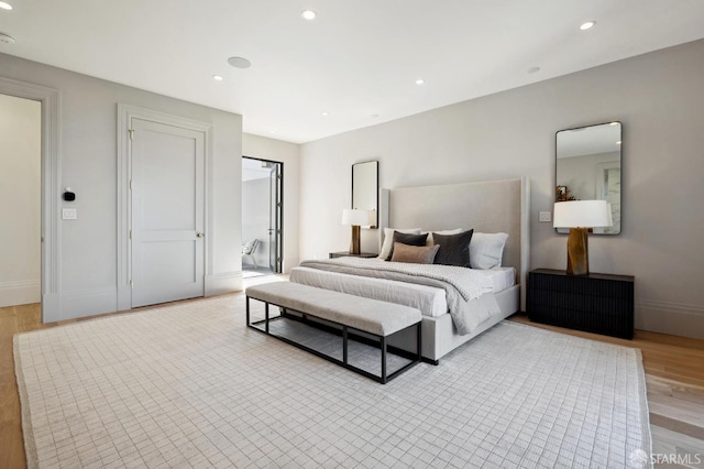 bedroom featuring light hardwood / wood-style flooring