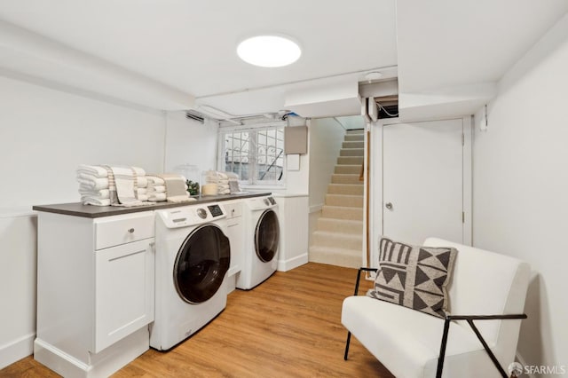 318 Caselli Ave, San Francisco, CA 94114 - laundry room featuring independent washer and dryer and light wood finished floors