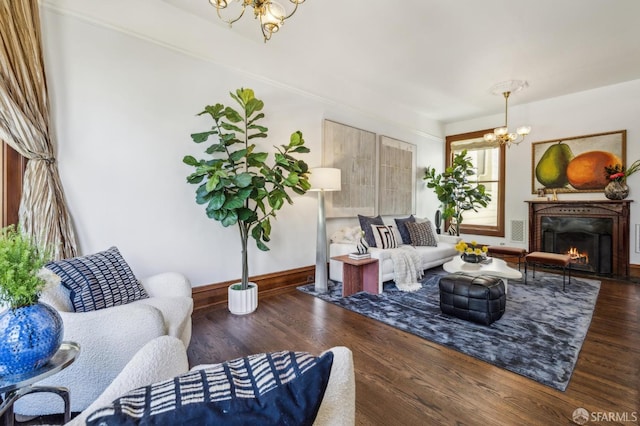 318 Caselli Ave, San Francisco, CA 94114 - living room featuring a chandelier, baseboards, a lit fireplace, and wood finished floors