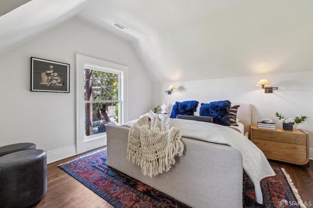 318 Caselli Ave, San Francisco, CA 94114 - bedroom with lofted ceiling, wood finished floors, and baseboards