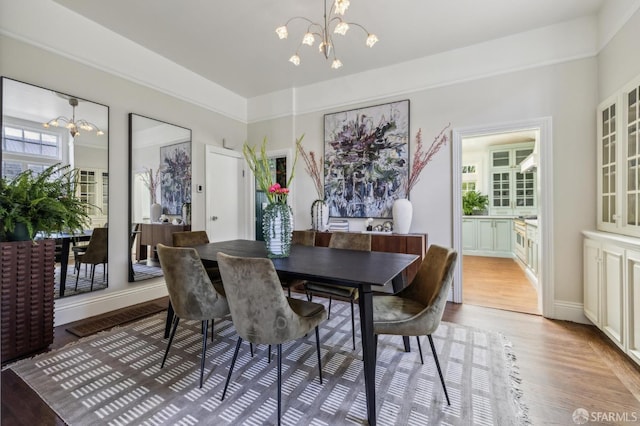 318 Caselli Ave, San Francisco, CA 94114 - dining area with a chandelier and wood finished floors