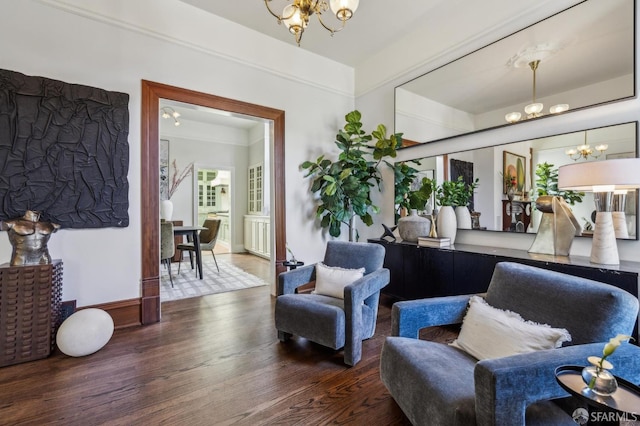 318 Caselli Ave, San Francisco, CA 94114 - living room featuring a chandelier, wood finished floors, baseboards, and ornamental molding