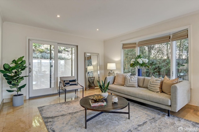 living room with ornamental molding