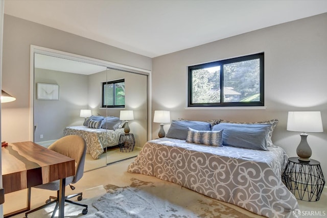 carpeted bedroom featuring a closet