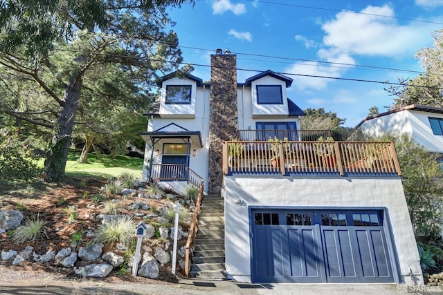 view of front of home with a garage