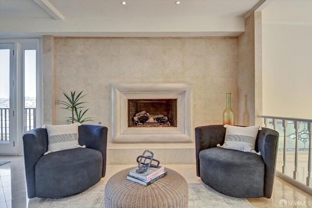 living area with tile patterned flooring