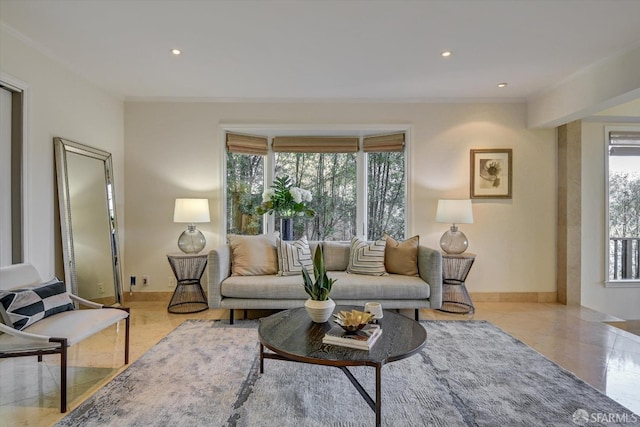 living room featuring a healthy amount of sunlight and light tile patterned floors