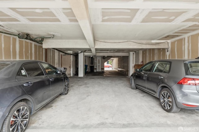 garage featuring a carport