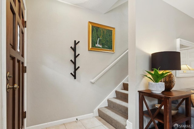 1421 El Camino Real Unit 3, Burlingame, CA 94010 - staircase featuring tile patterned flooring and baseboards