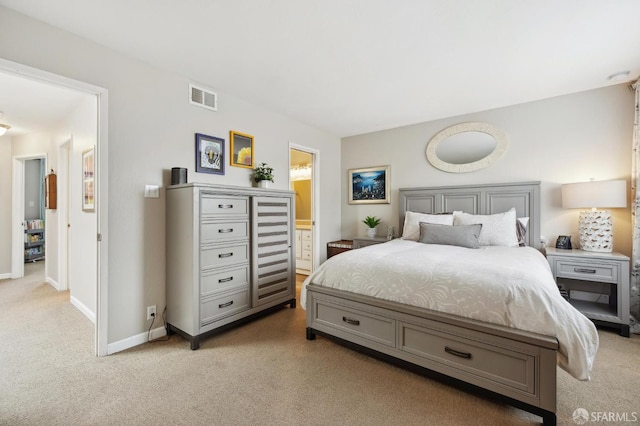 1421 El Camino Real Unit 3, Burlingame, CA 94010 - bedroom featuring light colored carpet, baseboards, and connected bathroom