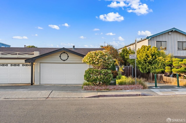 2811 Bayview Dr, Alameda, CA 94501 - view of front of home featuring an attached garage and concrete driveway