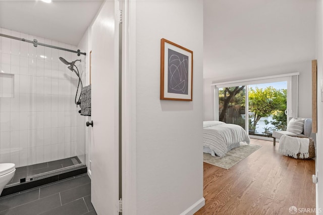 2811 Bayview Dr, Alameda, CA 94501 - bathroom featuring a shower stall, toilet, and wood finished floors