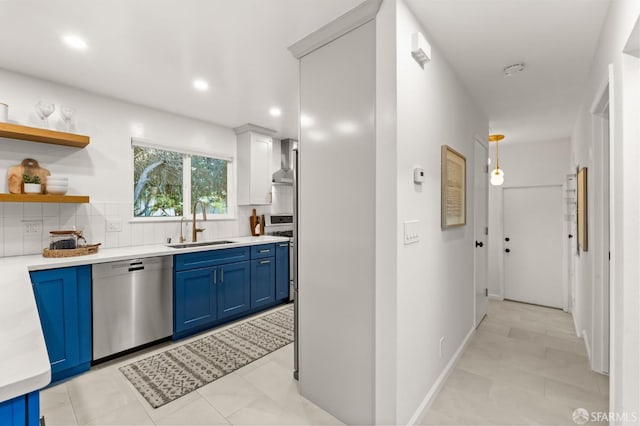 2811 Bayview Dr, Alameda, CA 94501 - kitchen featuring dishwasher, blue cabinetry, range, a sink, and wall chimney exhaust hood