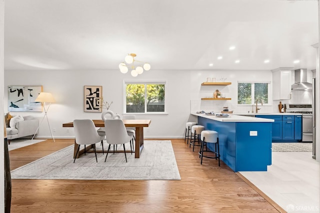 2811 Bayview Dr, Alameda, CA 94501 - dining room featuring a chandelier, recessed lighting, baseboards, and light wood-type flooring