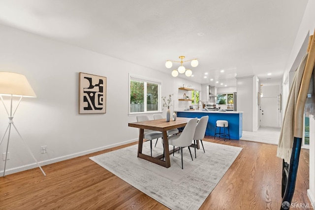 2811 Bayview Dr, Alameda, CA 94501 - dining area with light wood-style floors, baseboards, and recessed lighting