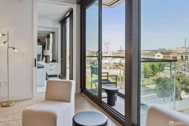2177 3rd St Unit 321, San Francisco, CA 94107 - entryway featuring floor to ceiling windows and wood finished floors