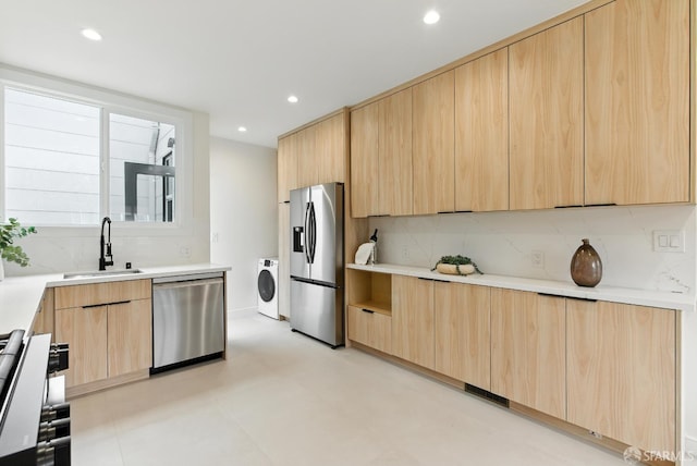 1204-1206 Funston Ave, San Francisco, CA 94122 - kitchen featuring light brown cabinets, appliances with stainless steel finishes, washer / clothes dryer, modern cabinets, and recessed lighting