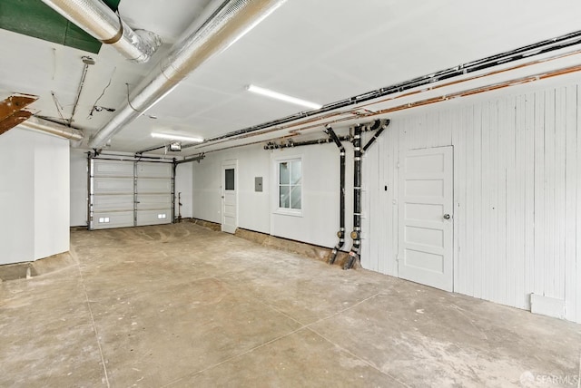 1204-1206 Funston Ave, San Francisco, CA 94122 - garage featuring a garage door opener and wooden walls