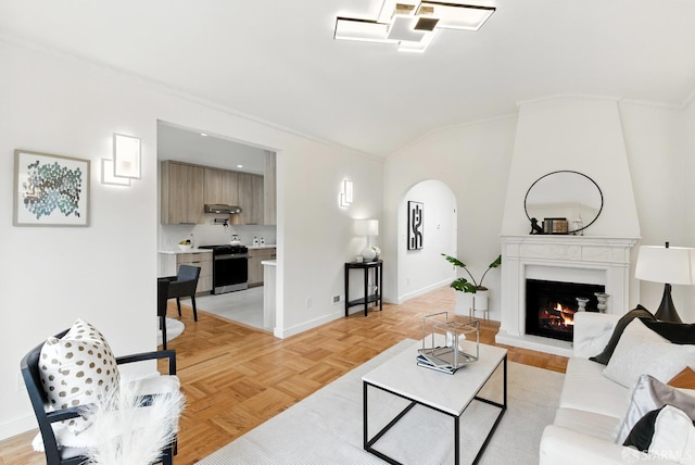 1204-1206 Funston Ave, San Francisco, CA 94122 - living area featuring arched walkways, a fireplace, vaulted ceiling, and ornamental molding