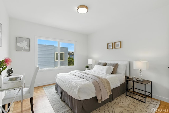 1204-1206 Funston Ave, San Francisco, CA 94122 - bedroom with light wood-style flooring and baseboards