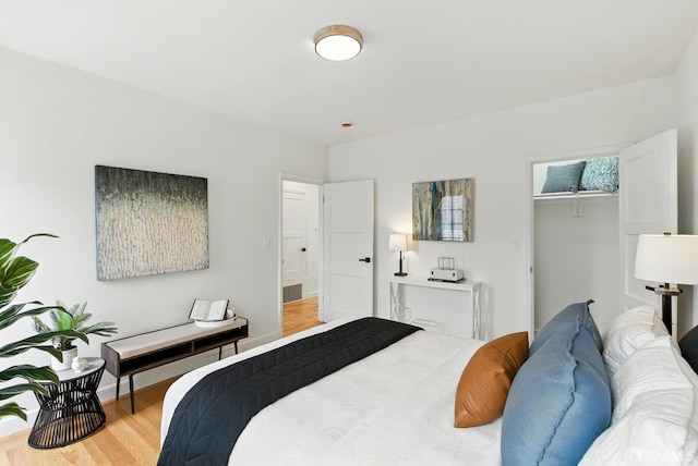 1204-1206 Funston Ave, San Francisco, CA 94122 - bedroom featuring light wood finished floors and baseboards